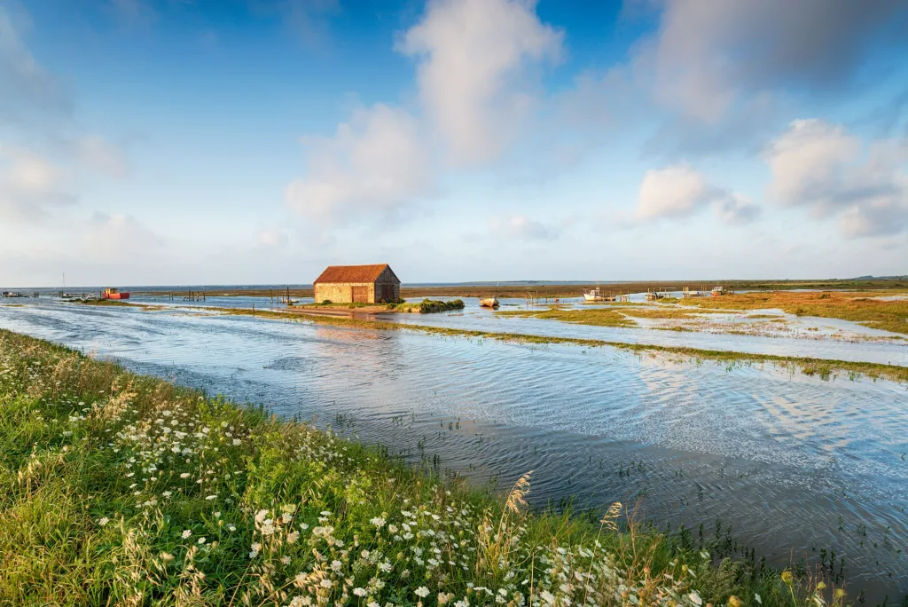 Hight tides flooding the harbour at Thornham